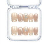 Naillover Whisper Beige handmade press on nails with sheer-to-nude gradient and silver gemstone accent from Singapore press on nails collection.